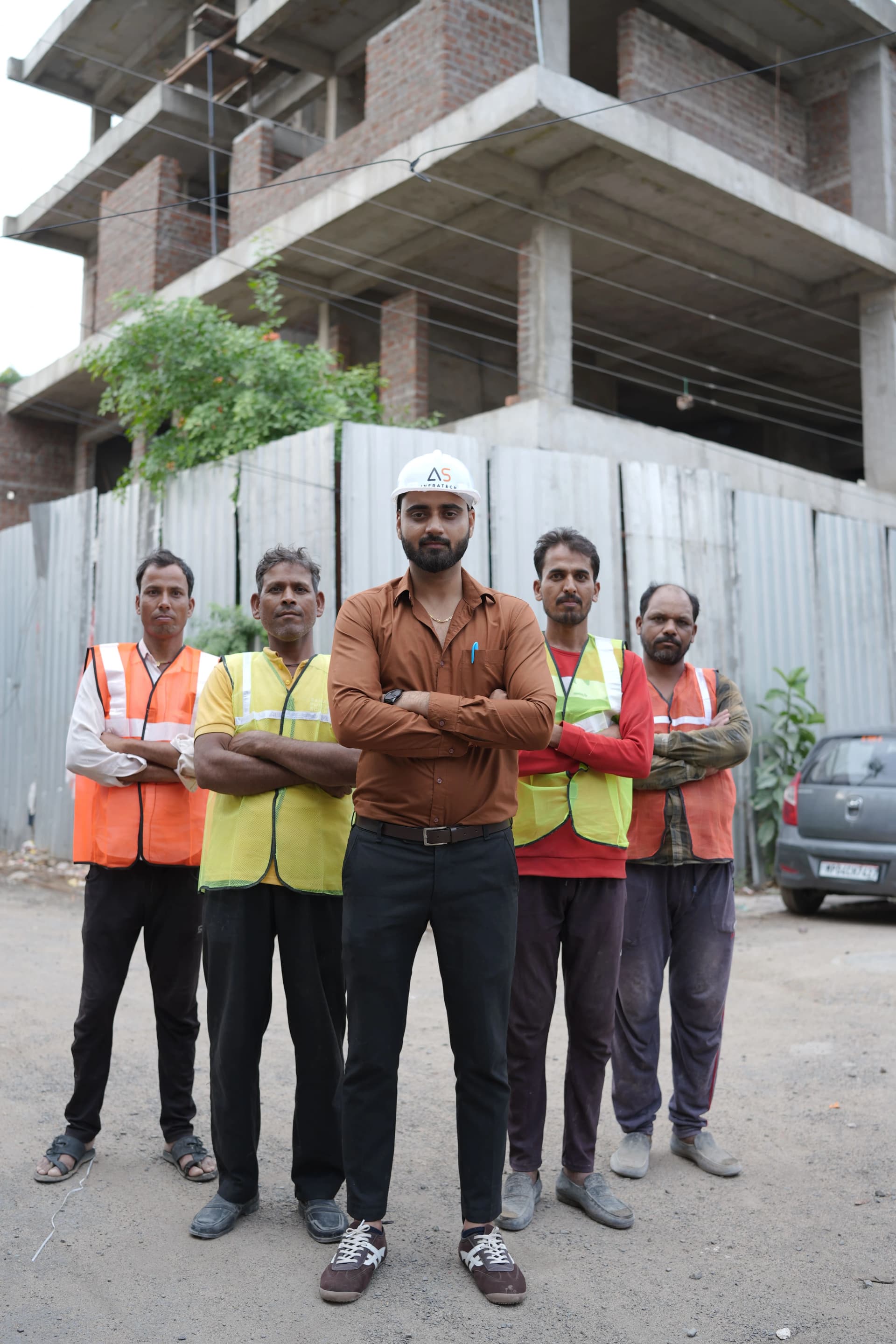 AS Infratech founder and team at construction site